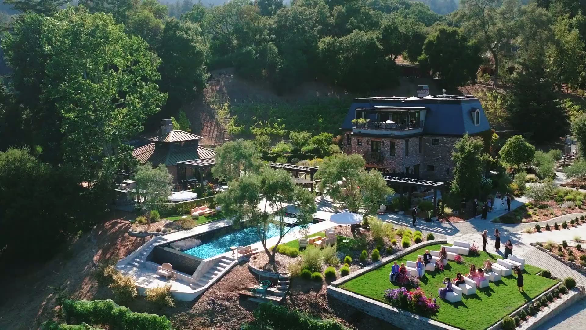 Private wine country estate at golden hour, set for a celebration